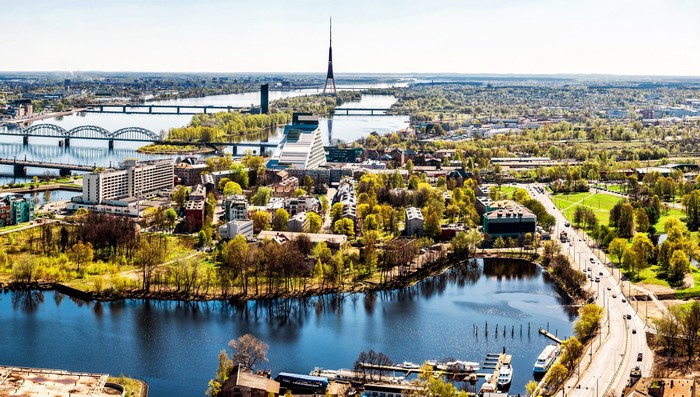 Riga, Latvia cityscape with bridges and river