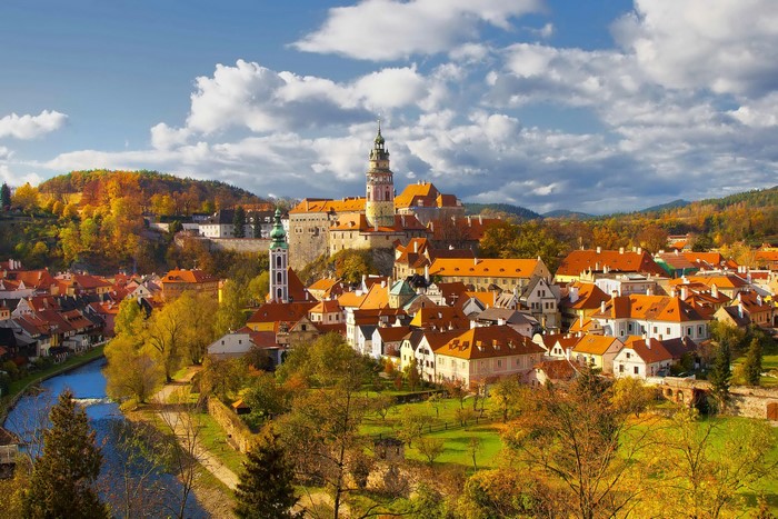Cesky Krumlov town with castle and river in autumn