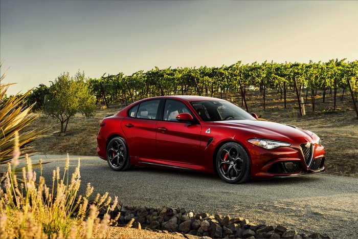 Red Alfa Romeo Giulia Quadrifoglio in Vineyard