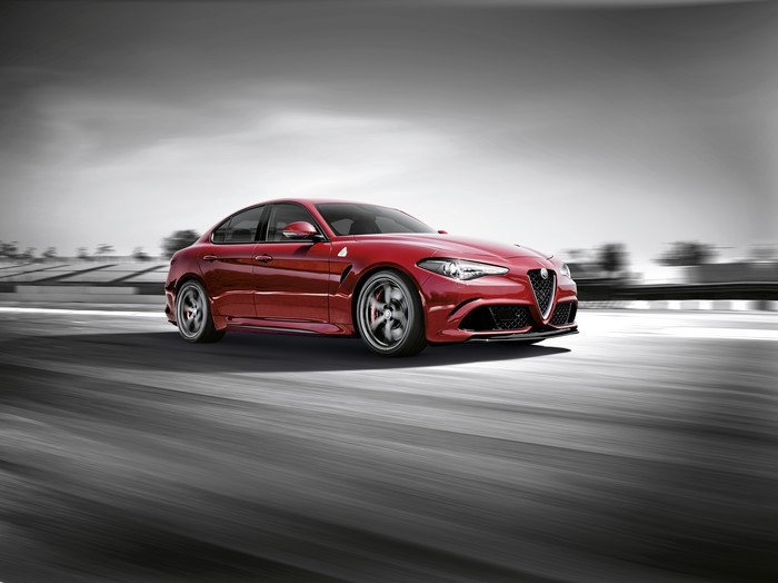 Red Alfa Romeo Giulia Quadrifoglio on Track
