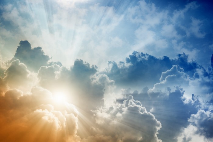 Sunlight Streaming Through Dramatic Clouds