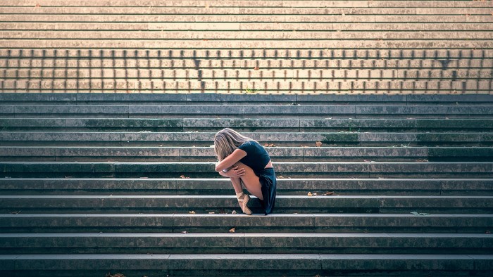 Vanessa on stairs in ballet shoes