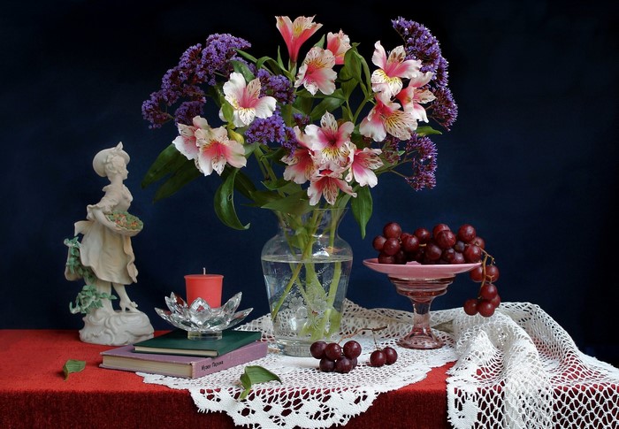 Still-life with Alstroemeria, Grapes, Sculpture, Candle, Vase, and Book