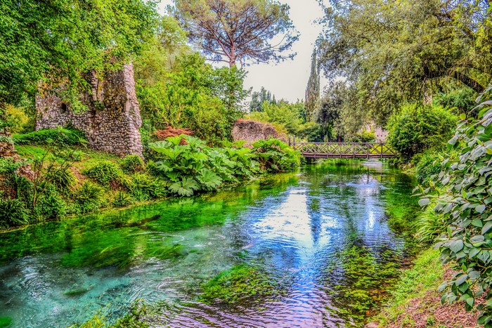 Garden of Ninfa, Italy, with river and bridge