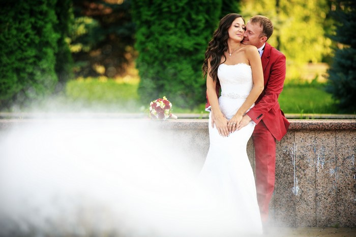 Bride and Groom in Red Suit