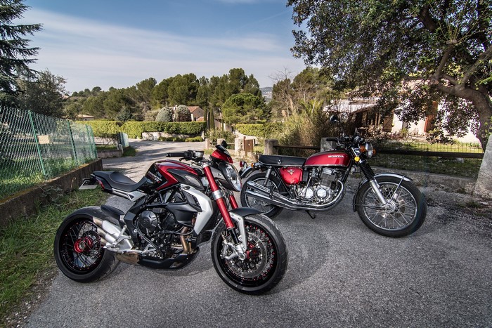 MV Agusta and Honda motorcycles parked outdoors