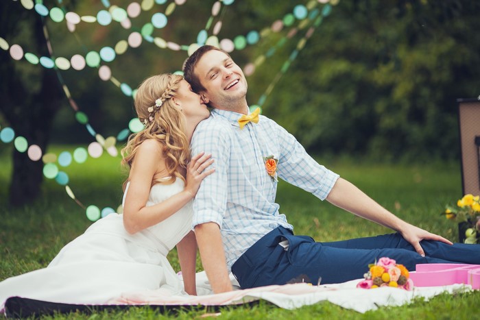 Bride and Groom in a park with decorations