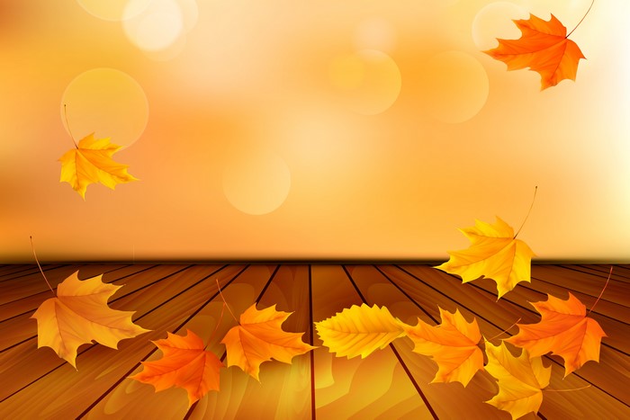 Autumn Leaves on Wood Planks Background