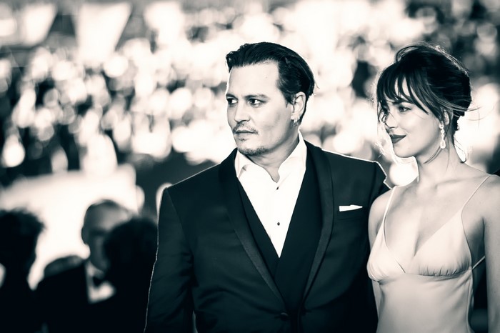 Johnny Depp and Dakota Johnson at Black Mass premiere