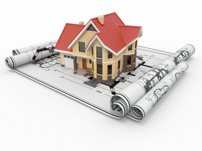 Model house on blueprints