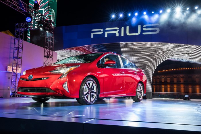 Red 2016 Toyota Prius on display