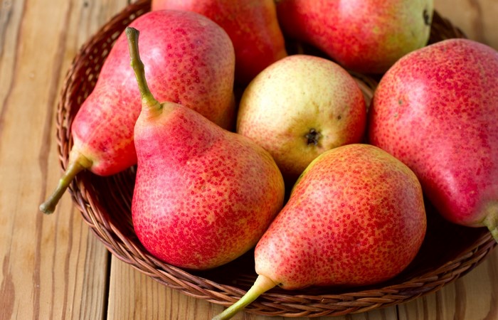 Red pears in a basket