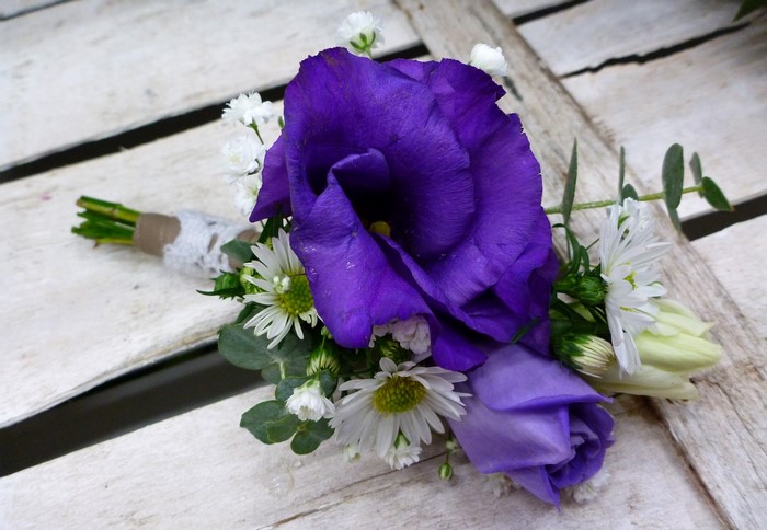 Purple Eustoma and white flowers boutonniere