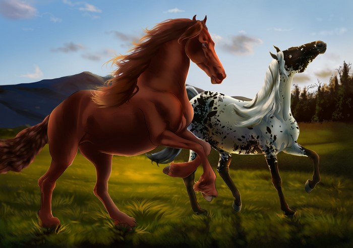 Two horses running in a field