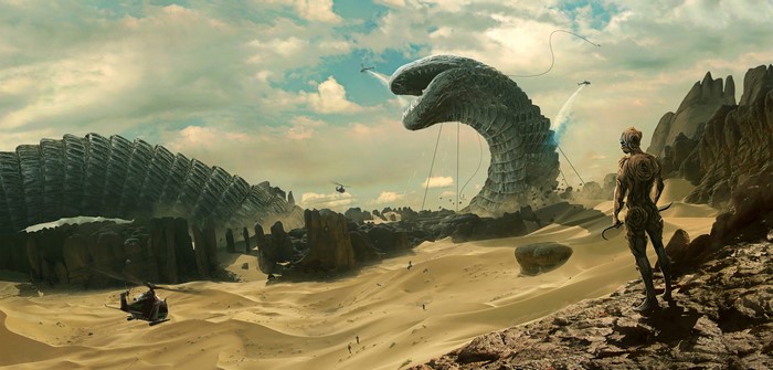 Giant sandworm in a desert landscape with helicopters