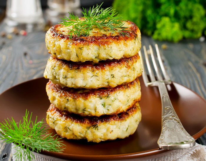 Stack of Fish Cakes with Dill and Fork