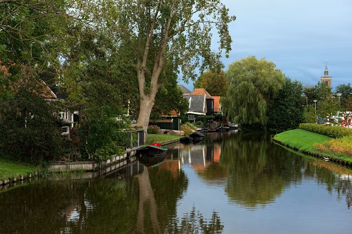 Canal in De Rijp Alkmaar, Netherlands with Houses and Boats