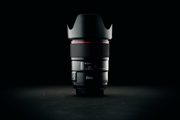Canon 35mm camera lens with lens hood