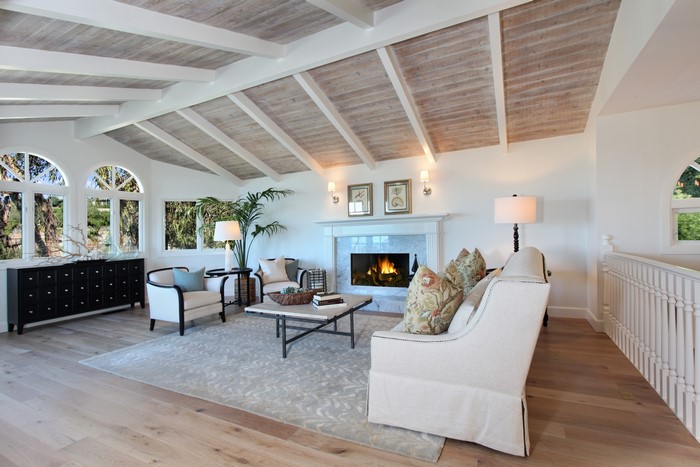 Living room with fireplace and vaulted ceiling