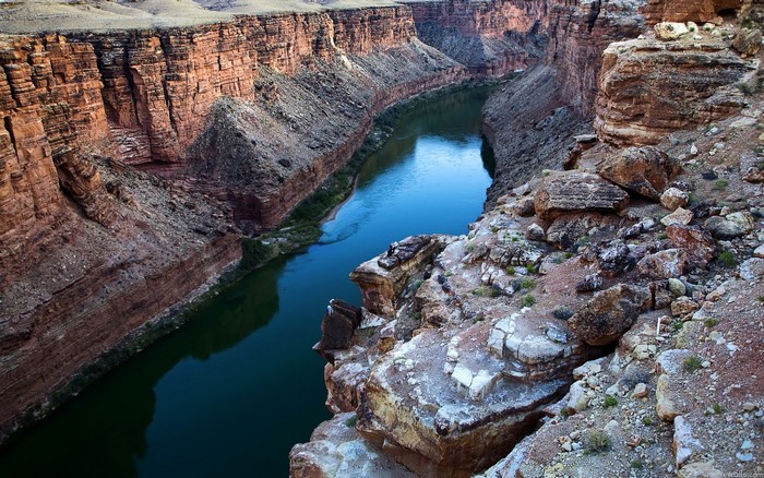 River flowing through a deep canyon with rocky cliffs