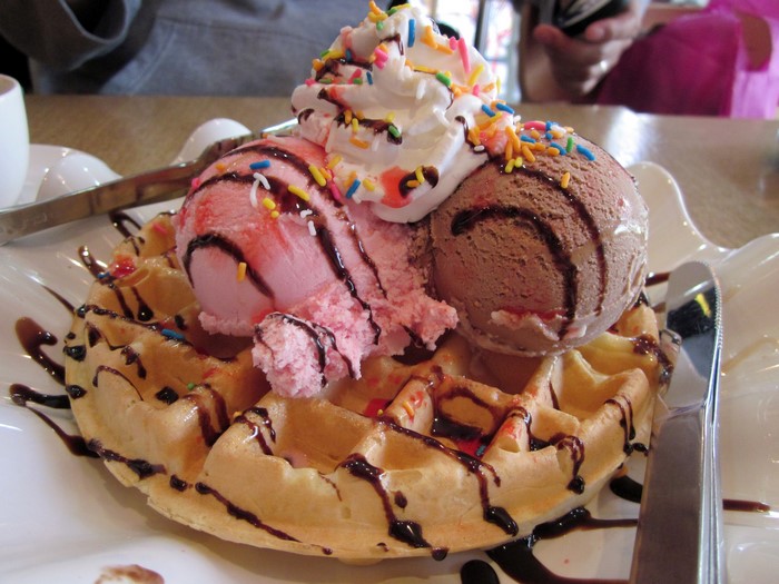 Waffle with ice cream and whipped cream