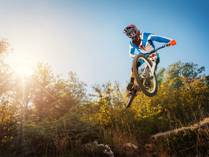 Mountain biker jumping in the air