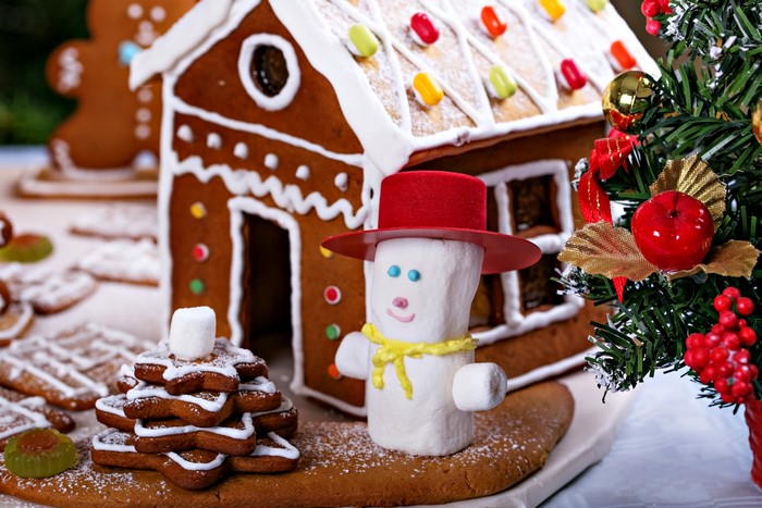 Gingerbread house with snowman and Christmas tree