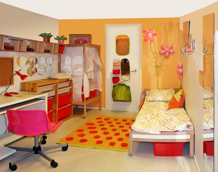 Children's bedroom with bed, desk, and storage