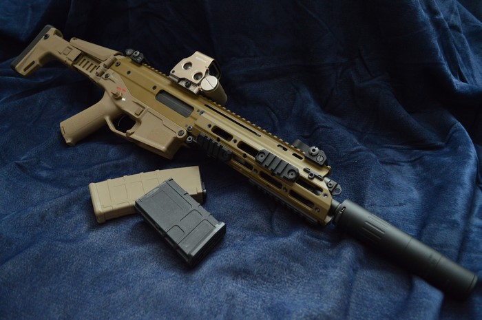 Bushmaster ACR rifle with magazines and suppressor