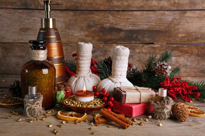 Christmas spa arrangement with candles and soaps