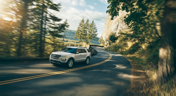 Ford Explorer driving on a winding road