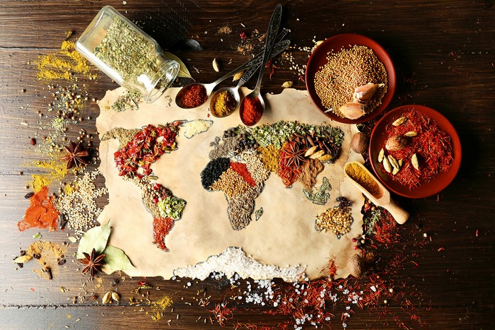 World map made of spices and herbs