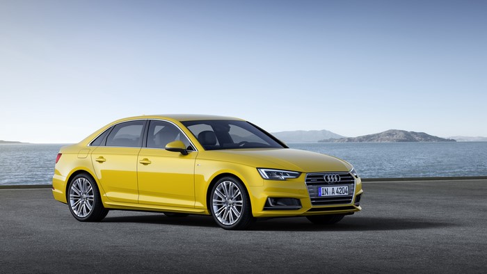 Yellow Audi A4 Sedan by the Water