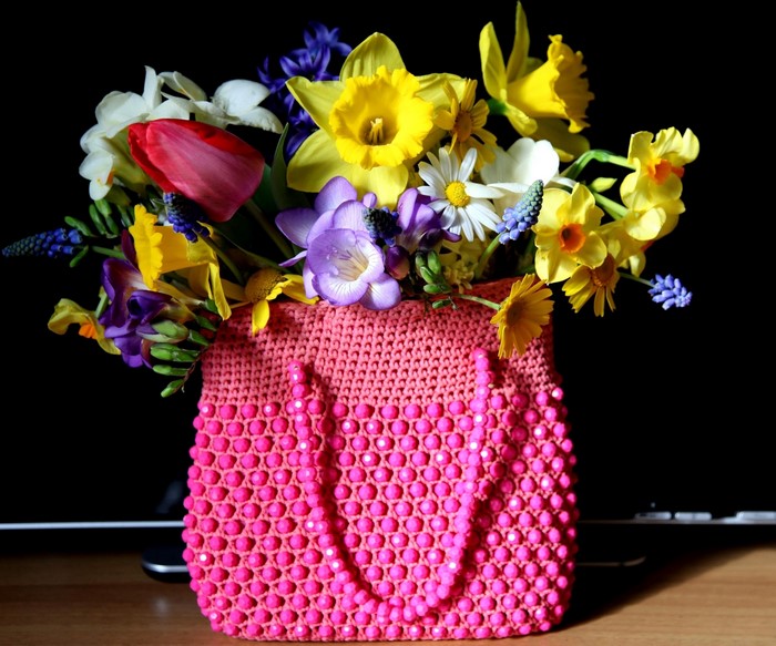 Bouquet of Daffodils, Tulips, Freesia, and Camomiles in a Pink Bag