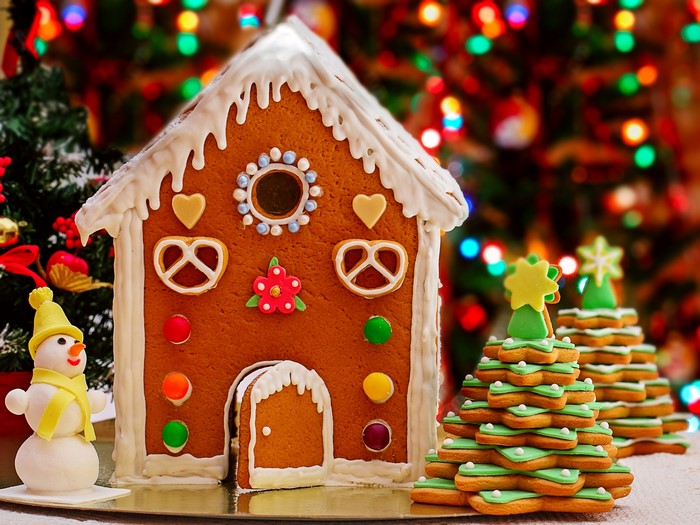 Gingerbread house and Christmas cookies with snowman