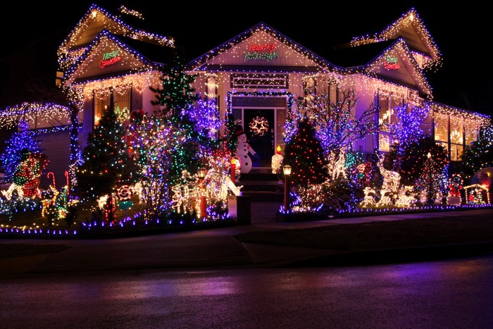 House decorated with Christmas lights at night