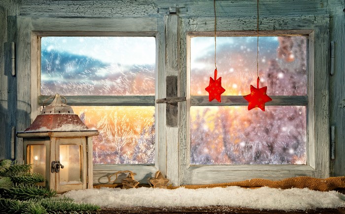 Christmas window with lantern and ornaments