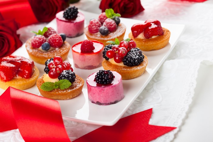 Assortment of Berry Tarts and Mousse Cakes