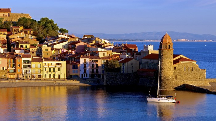 Collioure, France coast with colorful houses and church