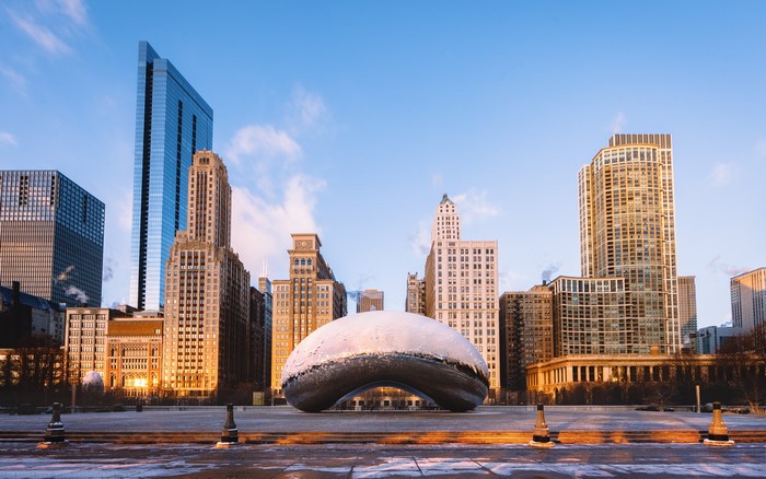 Cloud Gate sculpture in Chicago with skyscrapers