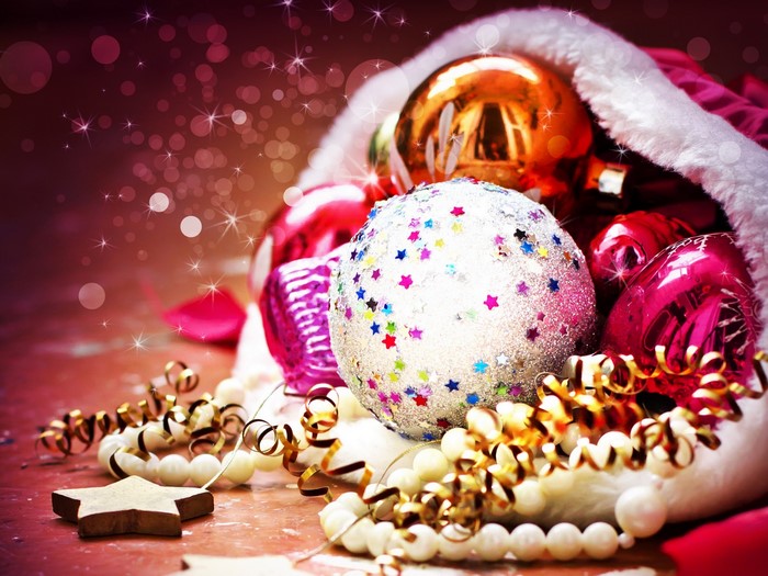 Christmas ornaments spilling from Santa's hat
