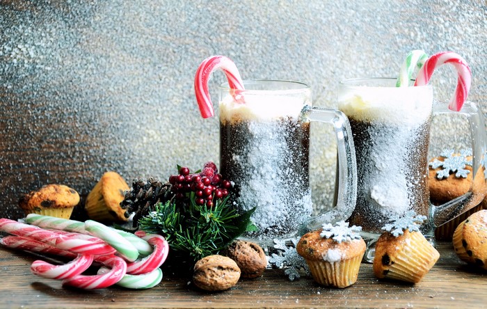 Christmas drinks with muffins and candy canes