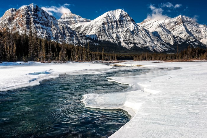 Snowy Mountains and River in Jasper National Park, Canada