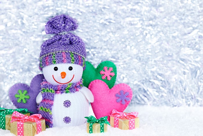 Christmas snowman with gifts and hearts