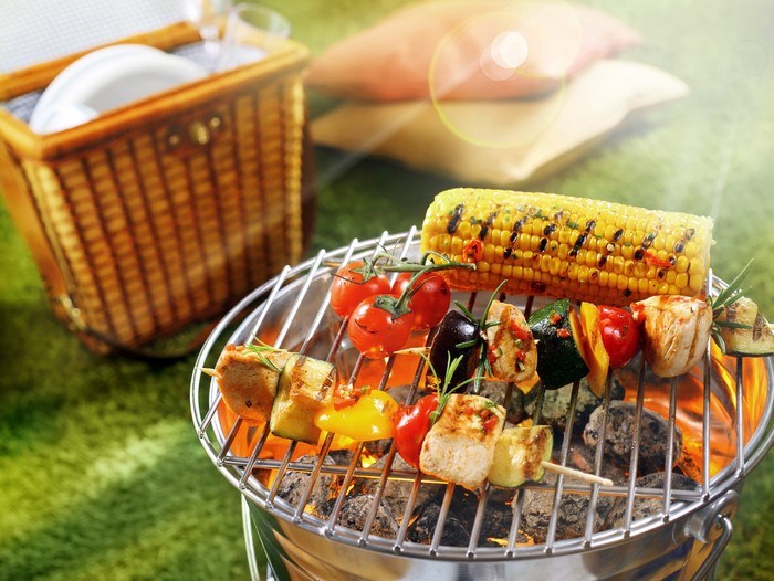 Barbecue with Corn, Kebabs, and Picnic Basket