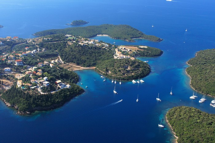 Sivota, Greece: Aerial view of coastal village and bay with sailboats