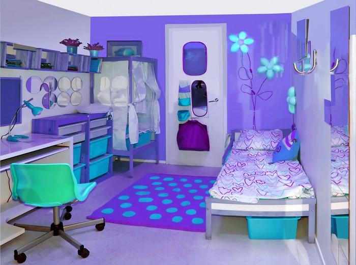 Purple and teal girl's bedroom with desk and bed