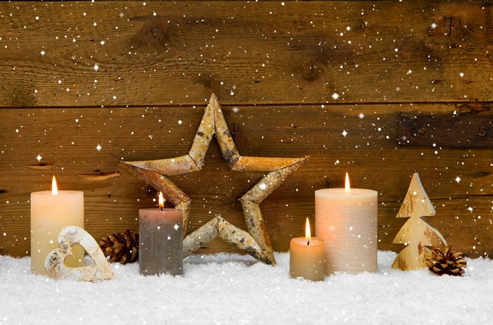 Christmas Candles and Decorations in Snow