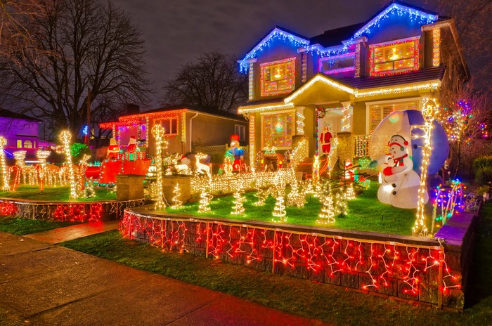 House decorated with Christmas lights at night