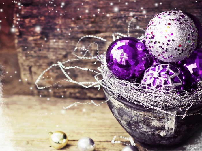 Christmas ornaments in a bowl with snow